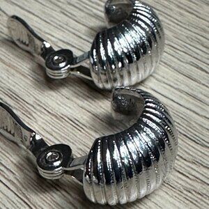 Monet vintage 1/2 hoop silver tone clip earrings